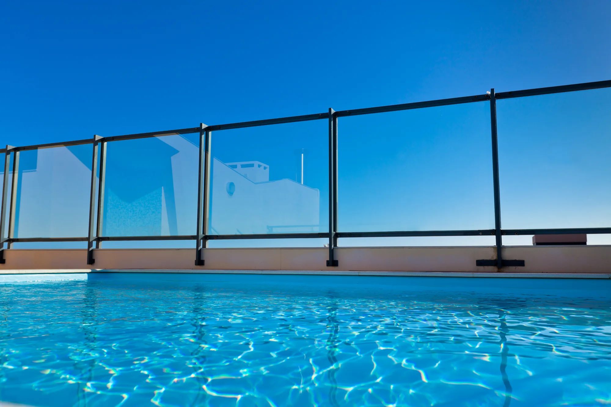 Close-up of glass pool fencing panels